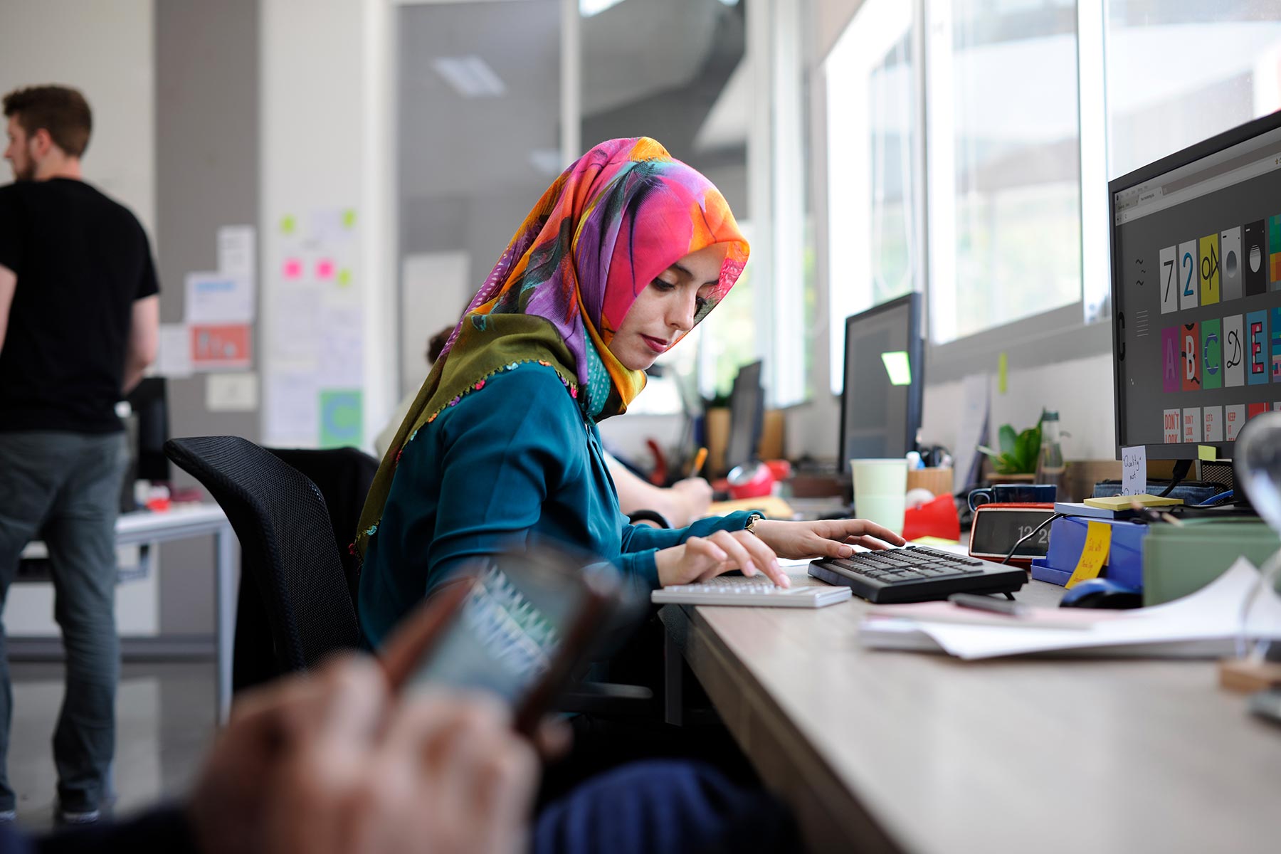 startup-business-people-working-in-office-PXCQ8A6.jpg